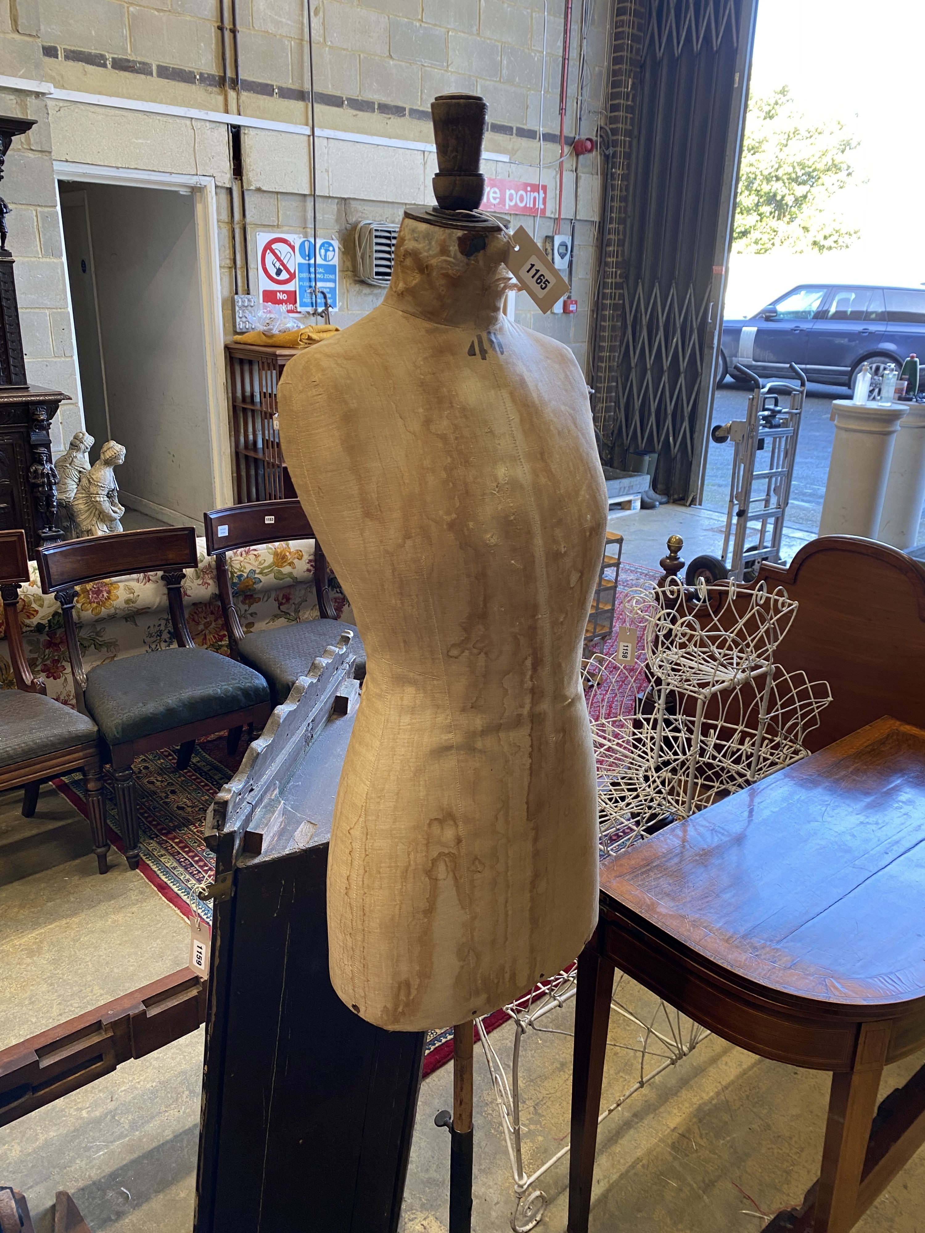 A Victorian tailor's dummy on iron tripod stand, height 170cm